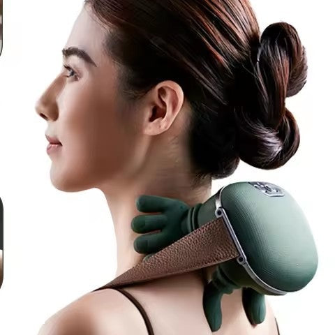 Woman relaxing while wearing the NOVU neck and shoulder massager at home